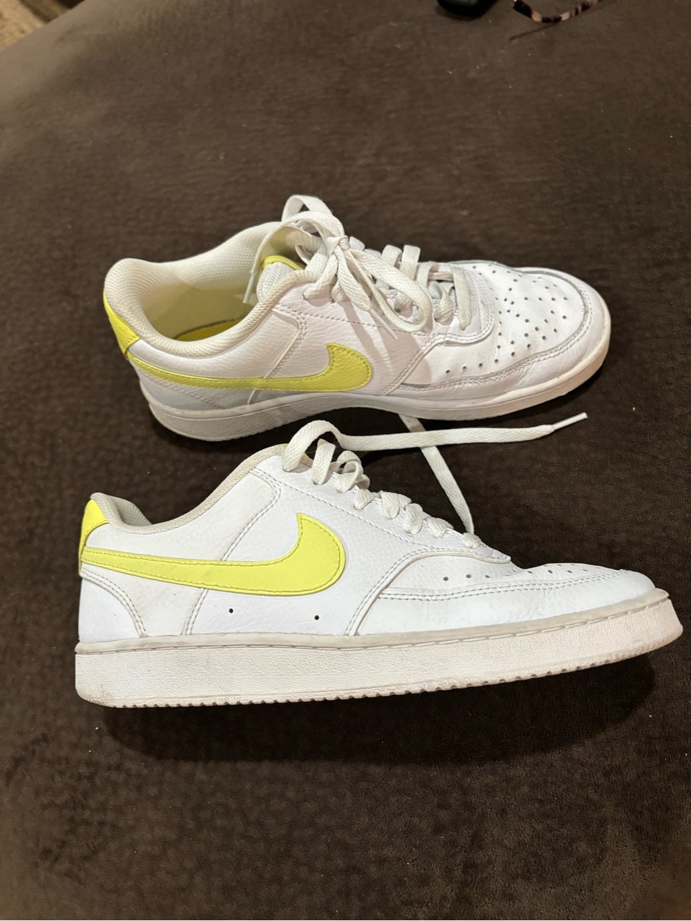 Nike White Low-Top Sneakers with Yellow Swoosh
